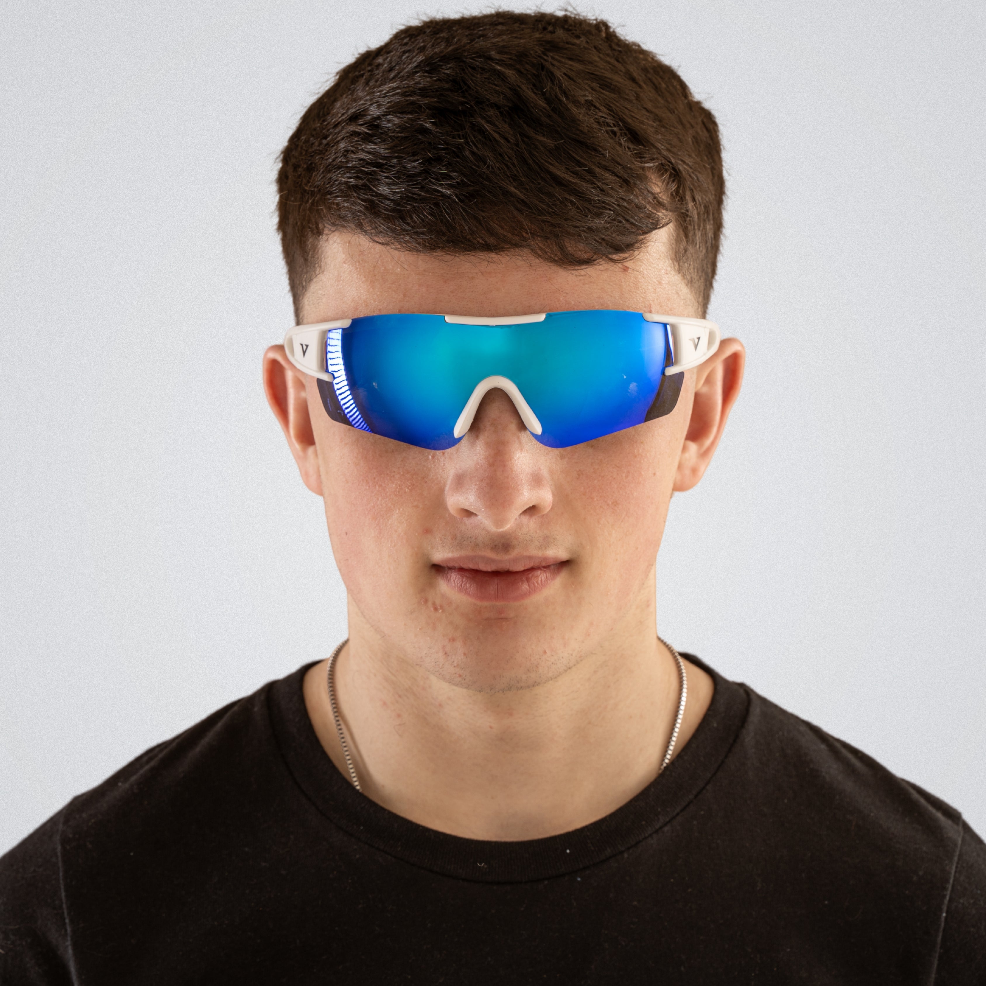 Model wearing velocity apex performance running and cycling hyrox and marathon sunglasses