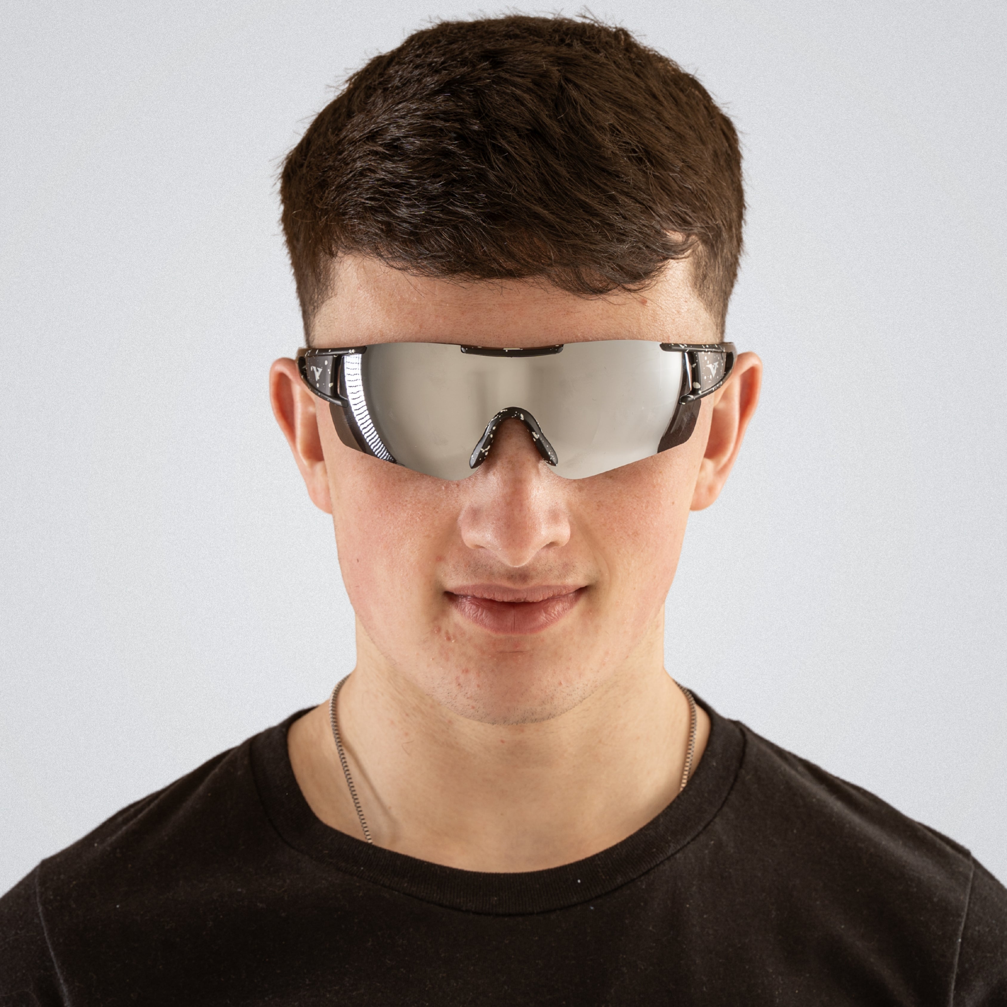 Ultra light-weight polarized sunglasses on a male models face