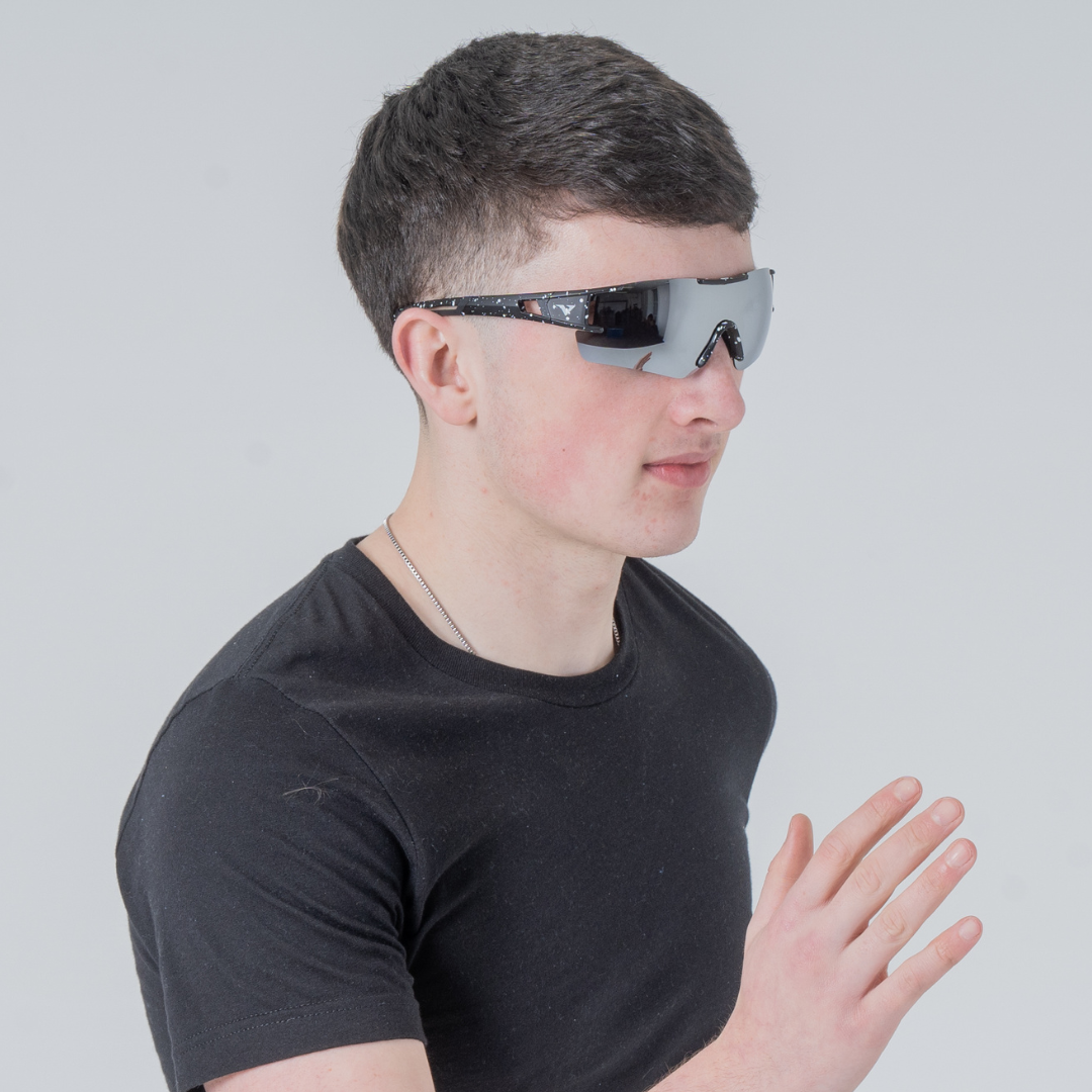 Side view of velocity polarized running sunglasses on a male model while running